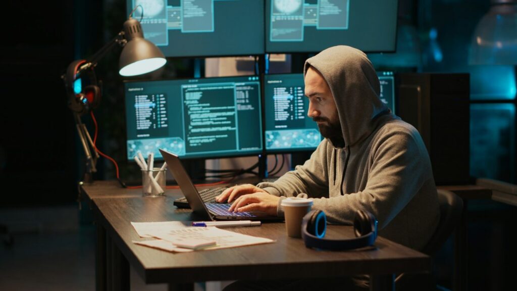 hacking thief breaking through cyber security system PlanetGuard AI